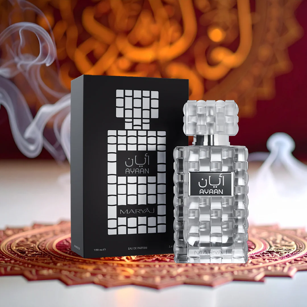 Maryaj Ayaan Fresh Pineapple Perfume For Unisex (Black, Silver Box & Perfume Bottle in smoky background) Maryaj Ayaan Fresh Pineapple Perfume For Unisex (Black, Silver Box & Perfume Bottle in smoky background)